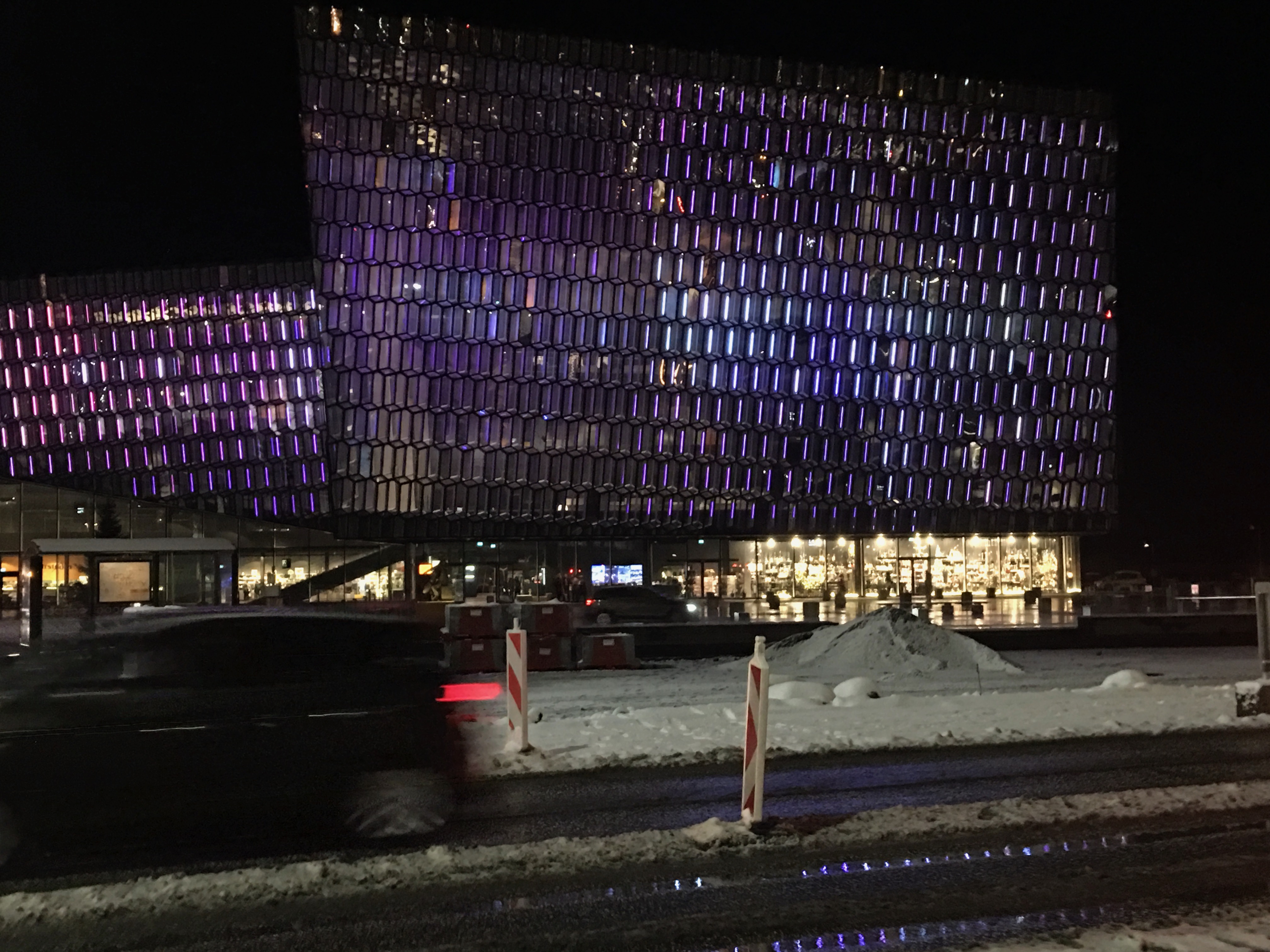 Harpa concert hall in Iceland lit up at night