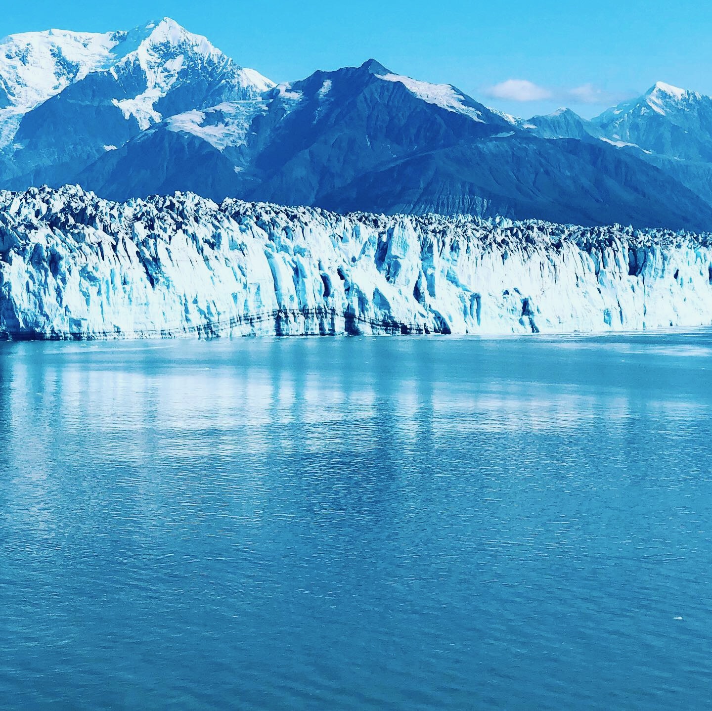 Hubbard glacier in Alaska with mountains in background